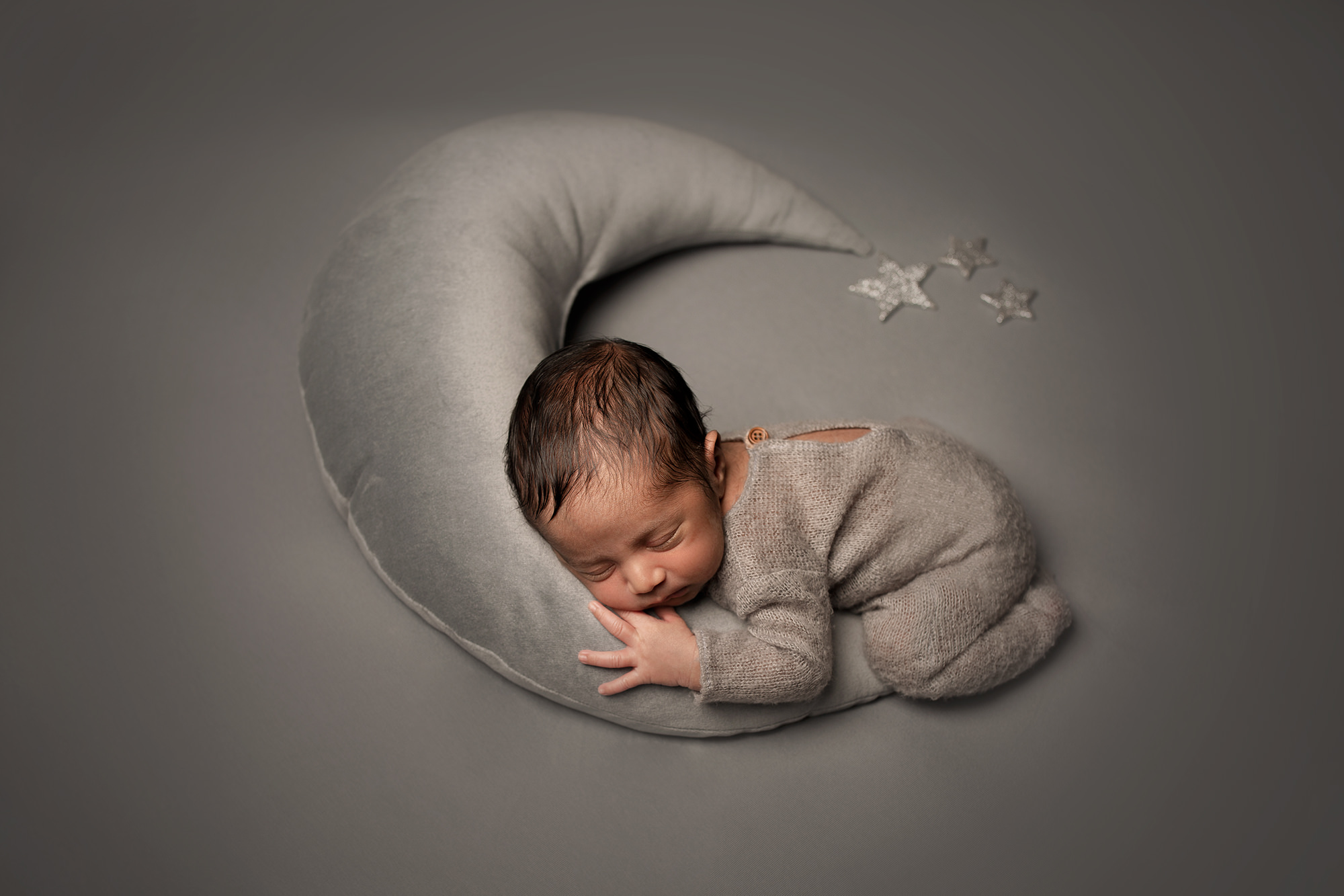 baby in a moon